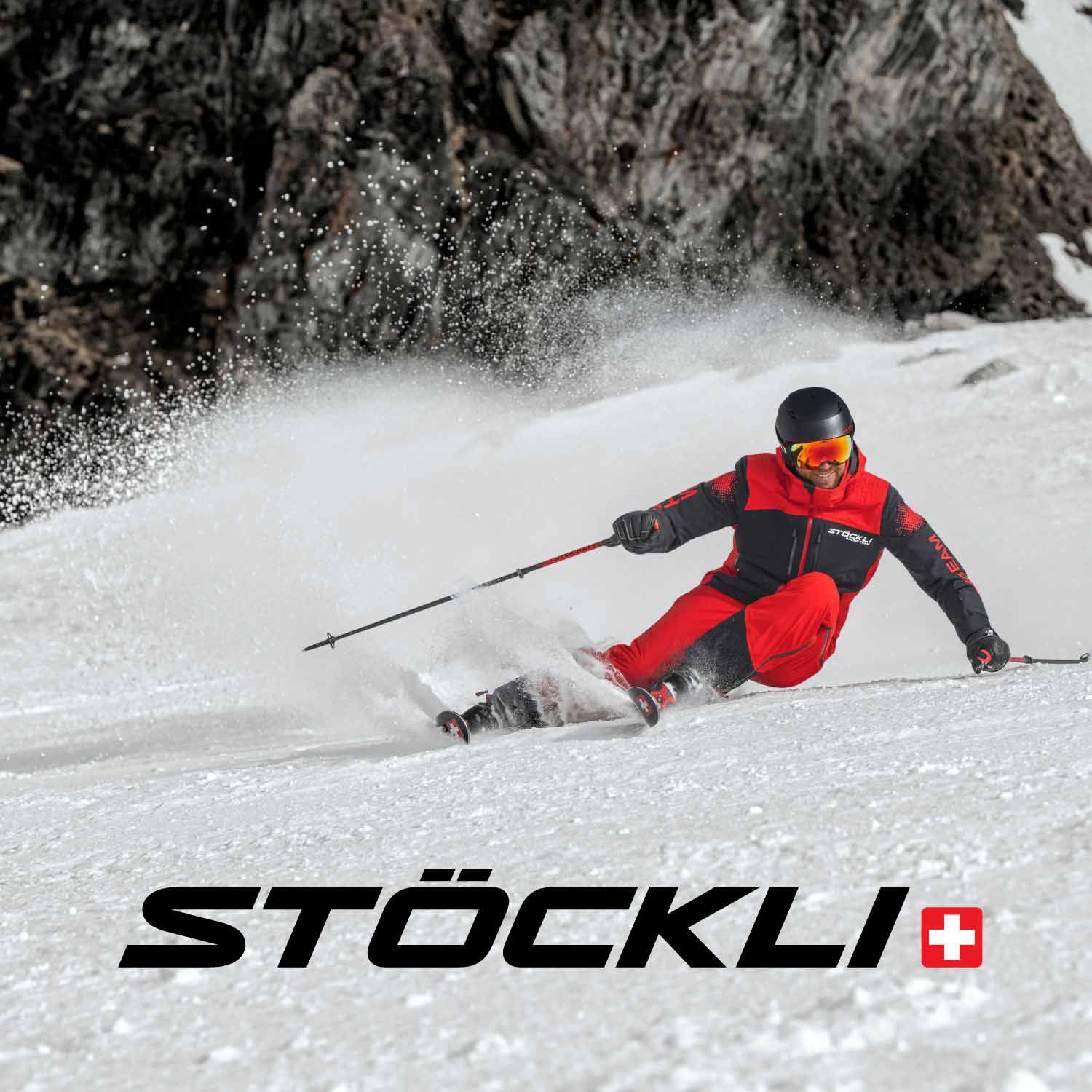 Mann-in-Stoeckli-Bekleidung-beim-Skifahren